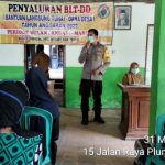Polisi Tuban Hadiri Penyaluran BLT – DD Di Desa Binaan, Pastikan Aman Dan Lancar.